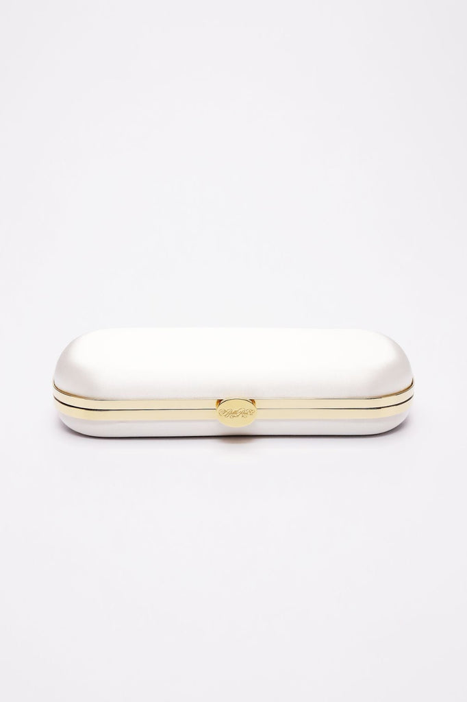 Elegant Bella Clutch Ivory Petite eyeglass case from The Bella Rosa Collection with gold trim and clasp closure on a white background, crafted as a bespoke accessory.