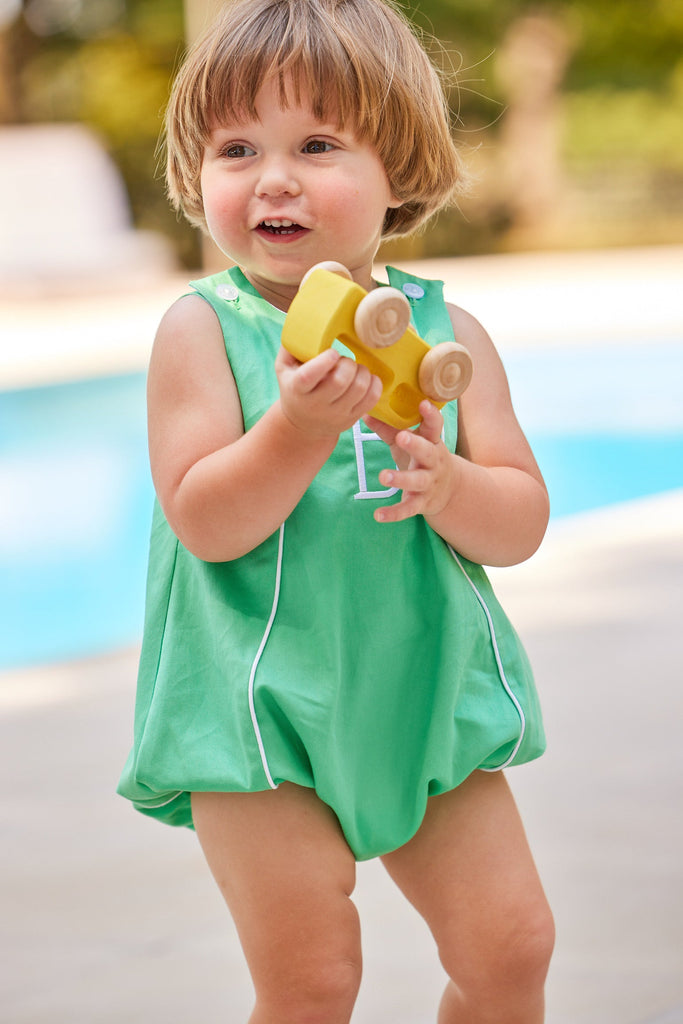 Little English traditional children's clothing. Green twill bubble with white piping for baby boy for Spring