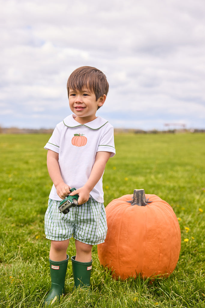Little English classic short set for little boys.  White knit peter pan shirt with applique pumpkin at the center and coordinating banded shorts in green Leland Plaid.