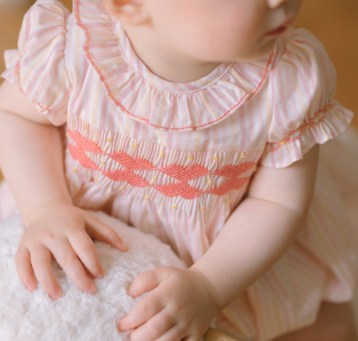 Capucine Pink Yellow Stripe Smocked Romper