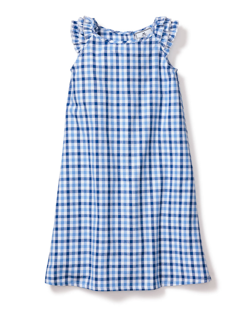 The Petite Plume Girl’s Twill Amelie Nightgown, in a royal blue gingham pattern with a ruffled neckline, is crafted from yarn-dyed cotton and displayed on a white background.