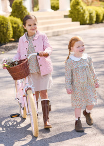 Little english classic childrens clothing, quilted jacket in light pink, hallie top in orange, blue, and green james floral, paperbag bow skirt in stone corduroy, evelyn dress in james floral, coordinating fall outfits for sisters