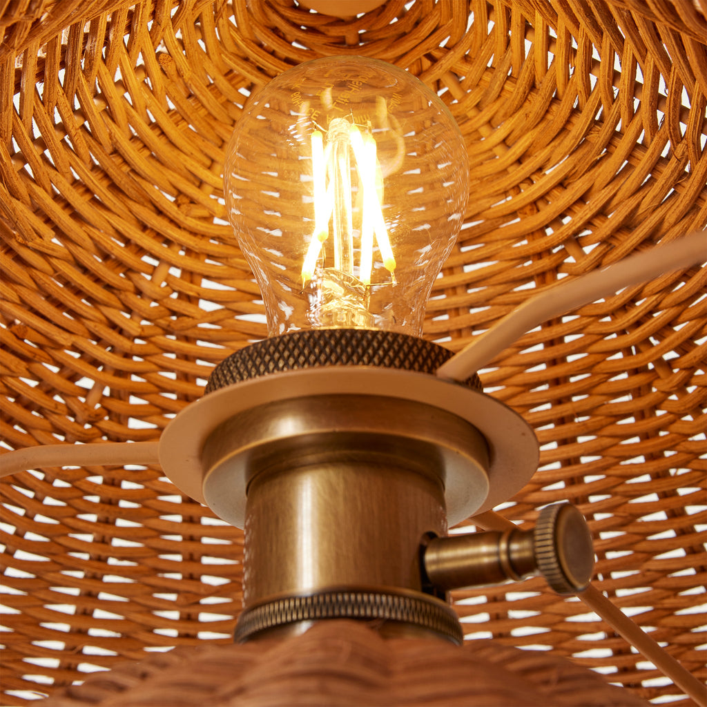 lightbulb inside rattan shade