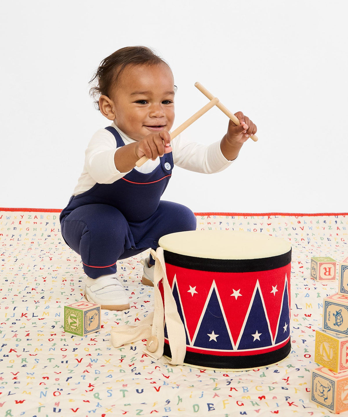 Frank T-Neck One-Piece in Vanilla Piping