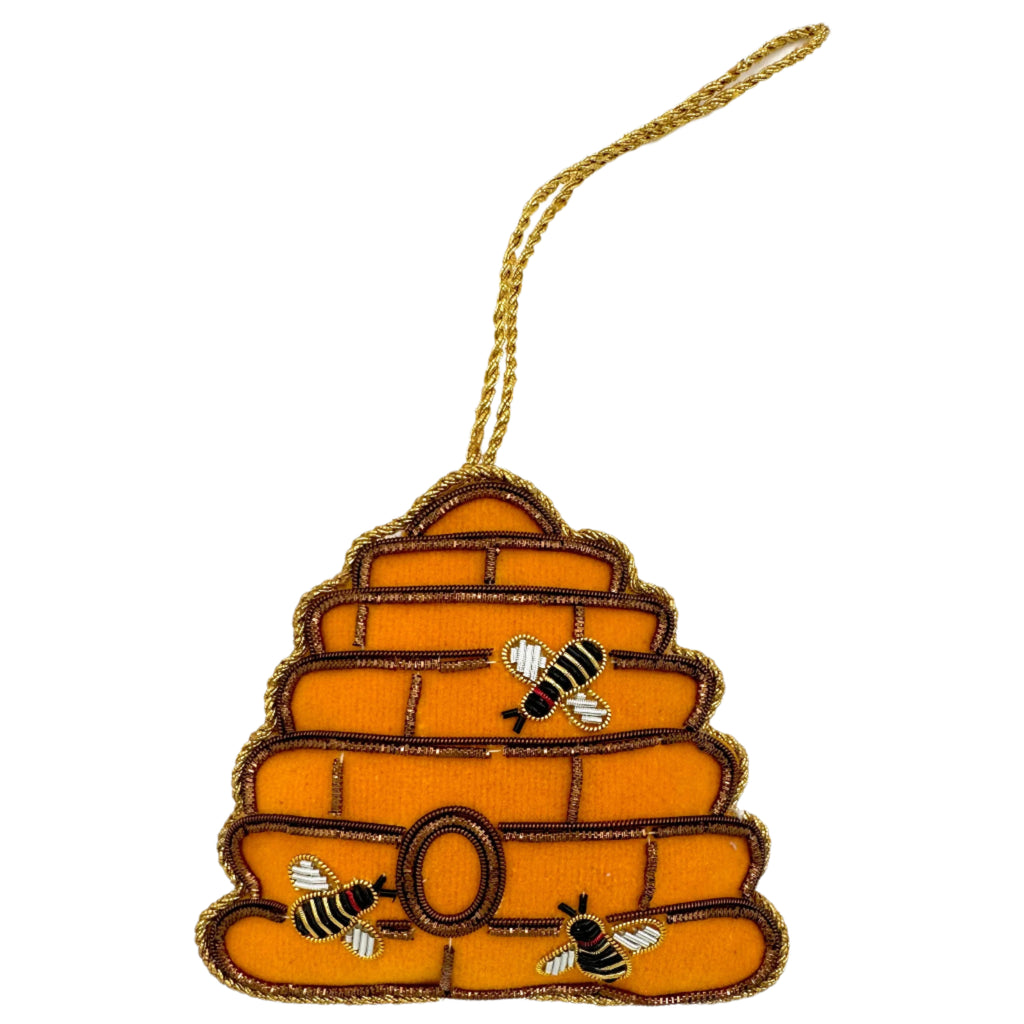 Image of a beehive Christmas ornament with intricate beadwork.