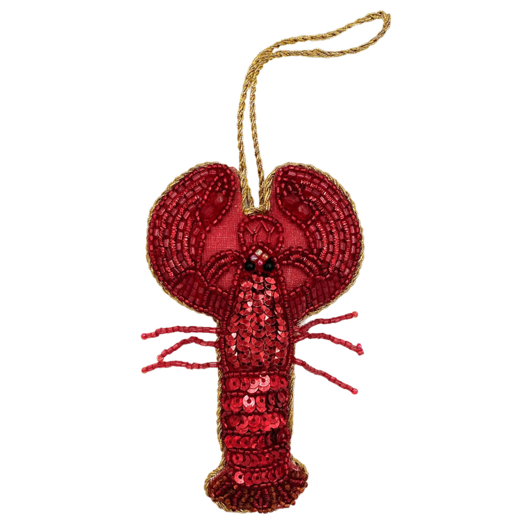 Image of a lobster Christmas ornament with intricate beadwork.