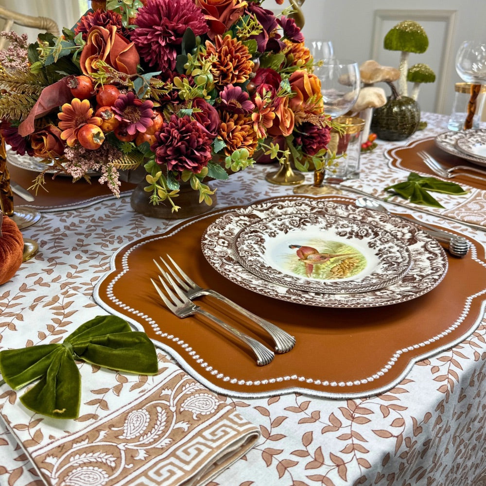 Woodland leaves tablecloth and napkin with leather Charlotte placemat and olive napkin bow- Woodland Spode china
