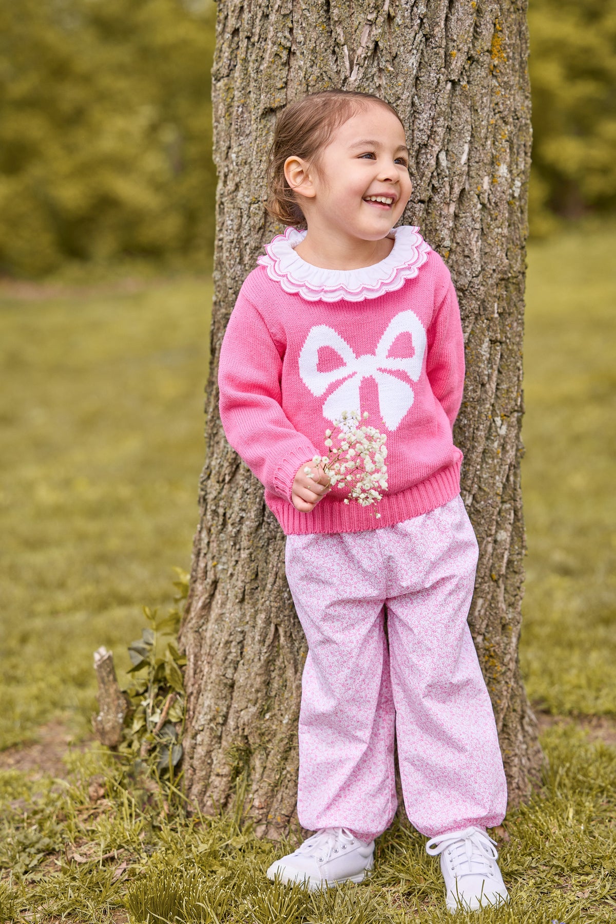little english classic children's clothing hot pink sweater with white bow motif, Double london blouse with hot pink trim on collar, banded bow pant in pink vinings pattern, fall outfit for girls