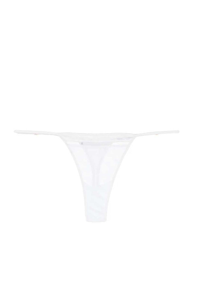 Soft modal g-string adjustable side straps silk trim ivory color flat lay