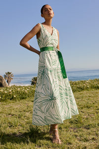 Sleeveless midi dress with green tropical leaf print and belted waist