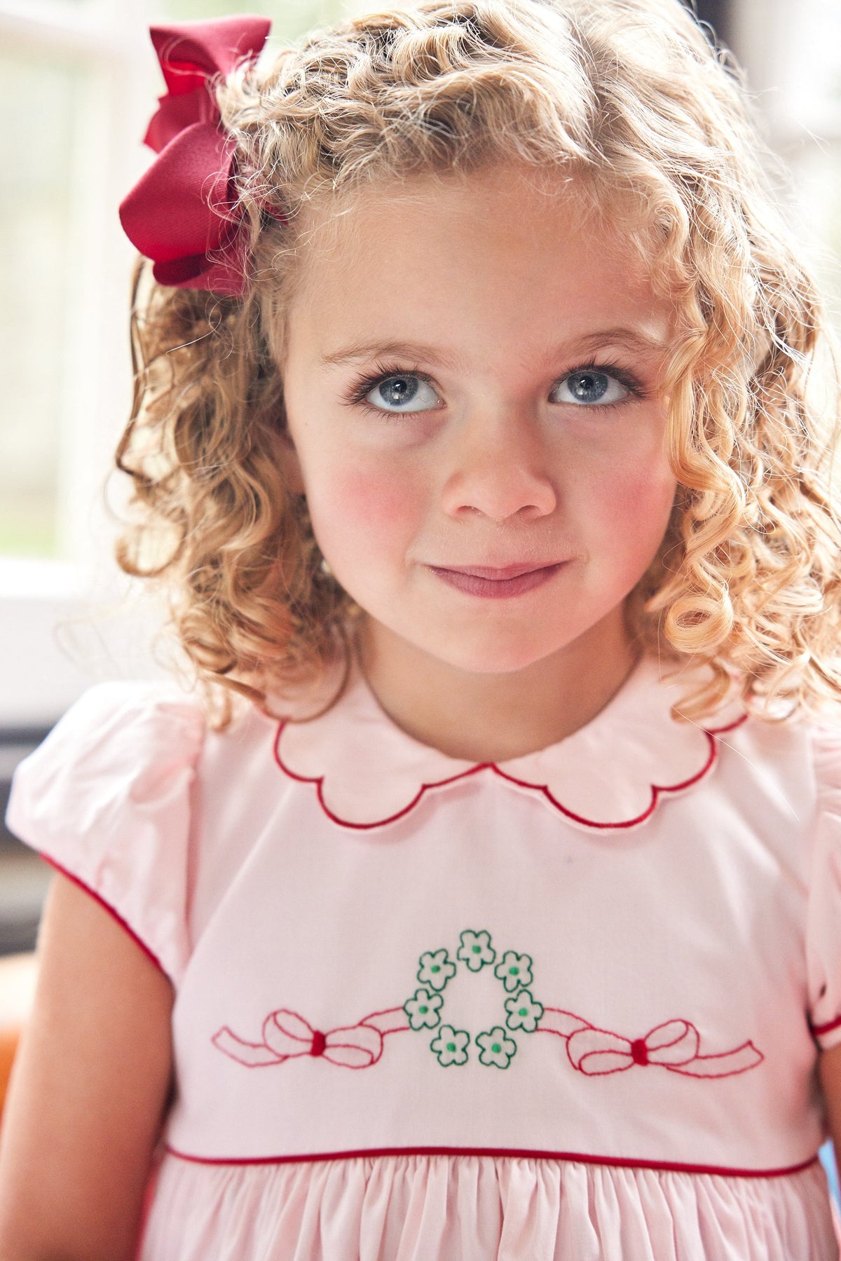 Little English Traditional clothing, Maisie Dress in light pink with wreath stitching on chest and bow in back for little girl, holiday