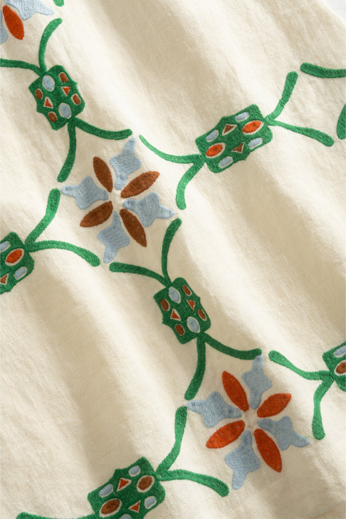 Artisan inspired embroidered skirt with a fitted shape and botanical motifs