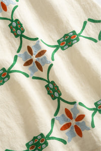 Artisan inspired embroidered skirt with a fitted shape and botanical motifs