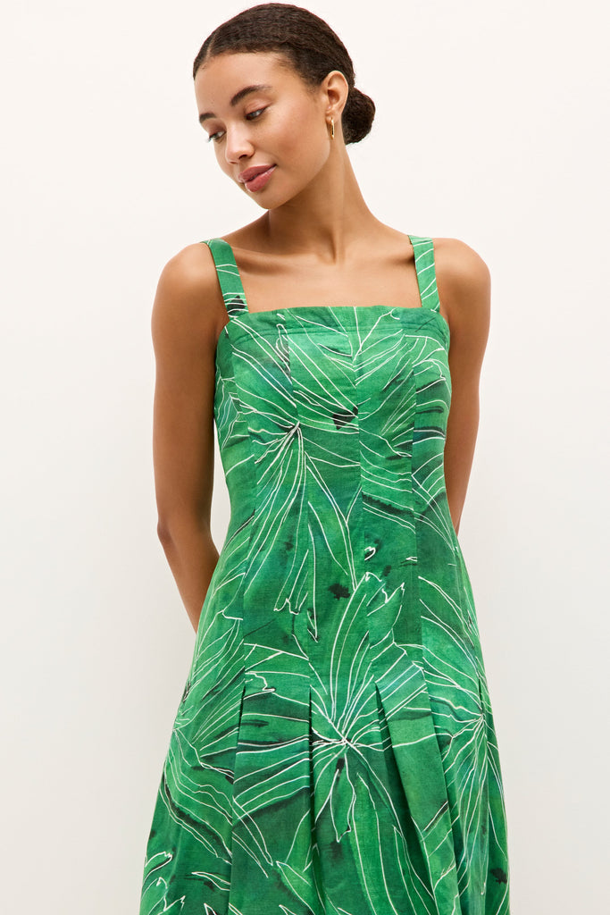 Fit and flare dress with a bold green botanical patterns and wide straps