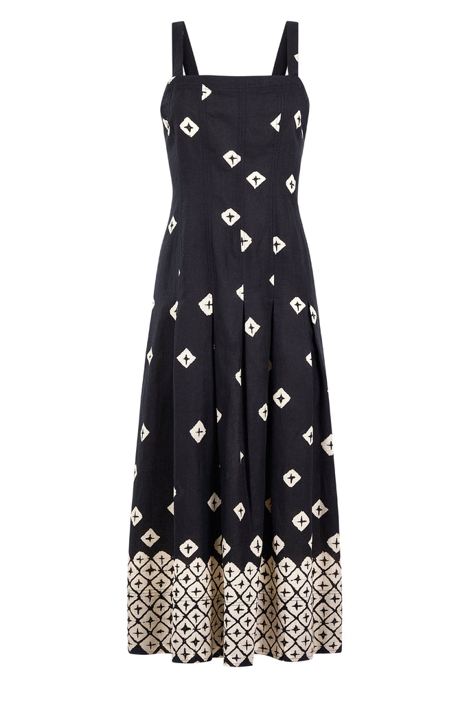 Black strappy dress with symmetrical cream motif detailing