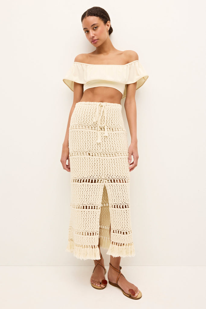 Cream crochet midi skirt with open stitch panels and front stitch detail