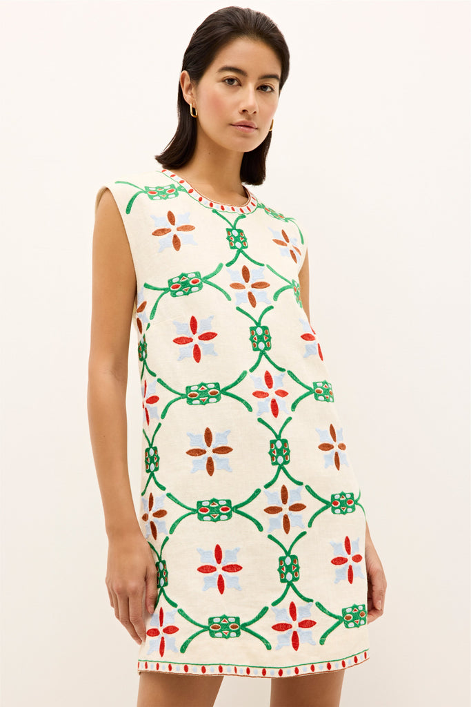 Embroidered cream dress with bold garden inspired pattern and crew neckline