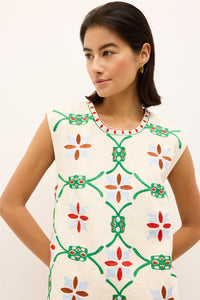Boho inspired mini dress with multicolor embroidered flowers and a relaxed fit