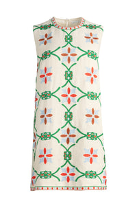 Summer mini dress with multicolor embroidered flowers and a relaxed fit