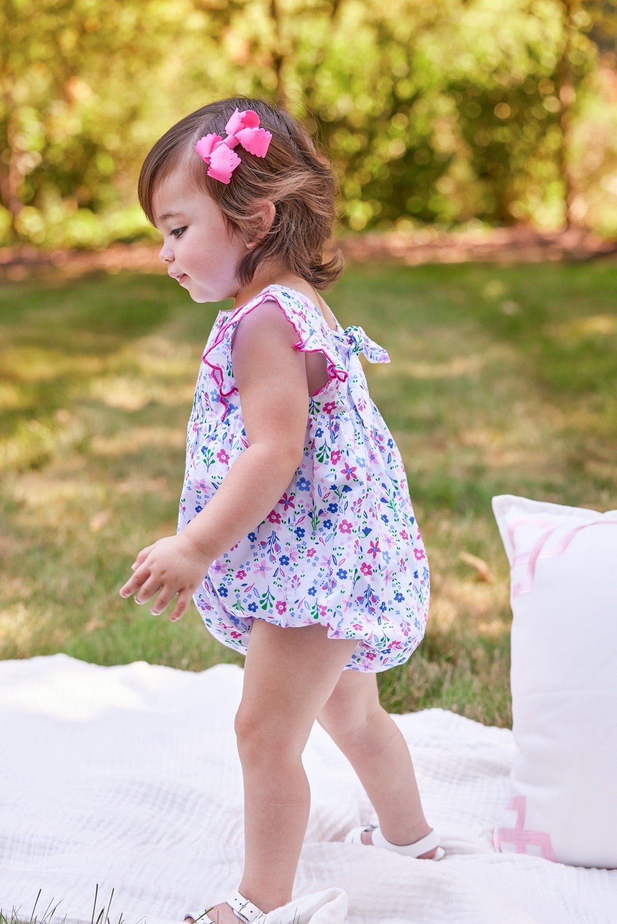 Little English traditional children's clothing.  Blue and pink floral bubble for baby girls for Spring and Summer