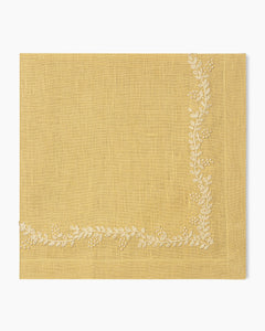 A Prism Vine Linen Dinner Napkin in 13 Colors by Henry Handwork with white embroidery, perfect for table linens.