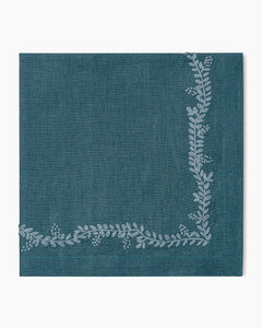 A Prism Vine Linen Dinner Napkin - 13 Colors with a floral pattern, perfect for enhancing your table linens collection.