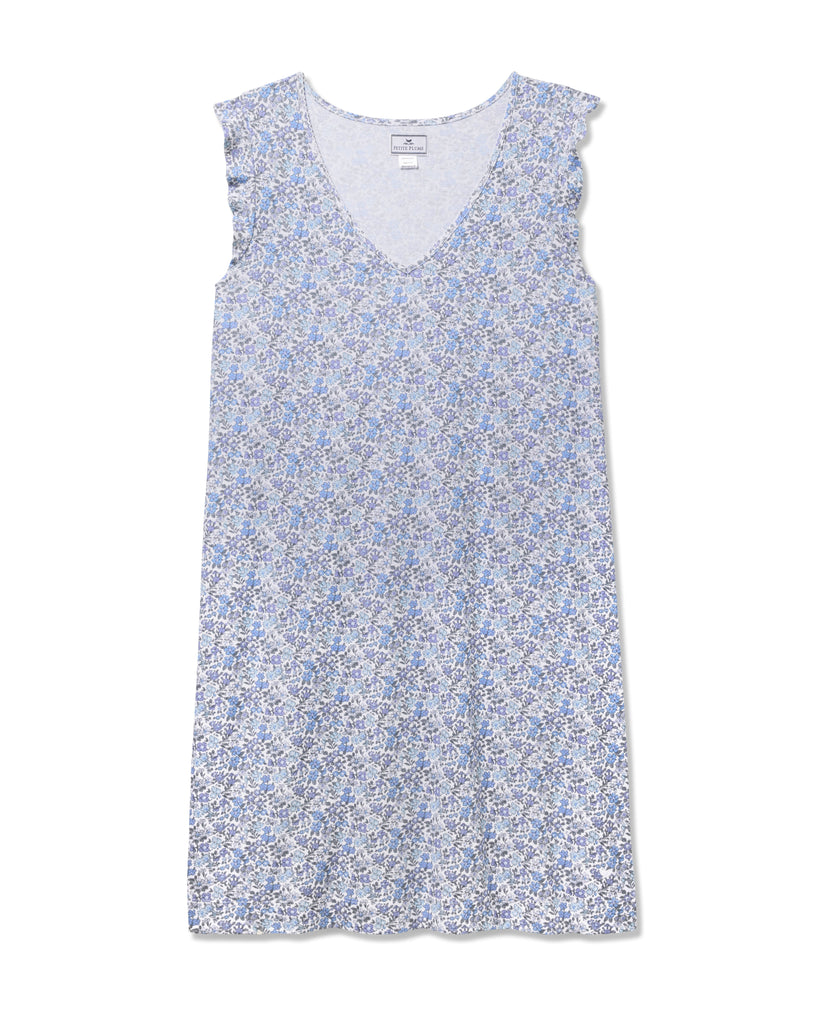 The Womens Pima Harper Nightgown in Fleur dAzur by Petite Plume features a vintage-inspired blue and white floral print. With its V-neckline and soft, flowy fabric, this piece combines casual comfort with timeless charm.