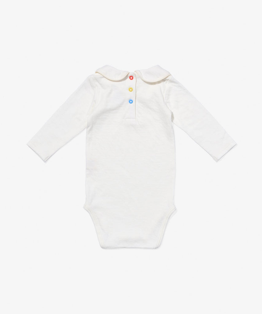 Peter Pan One-piece in Vanilla Piping