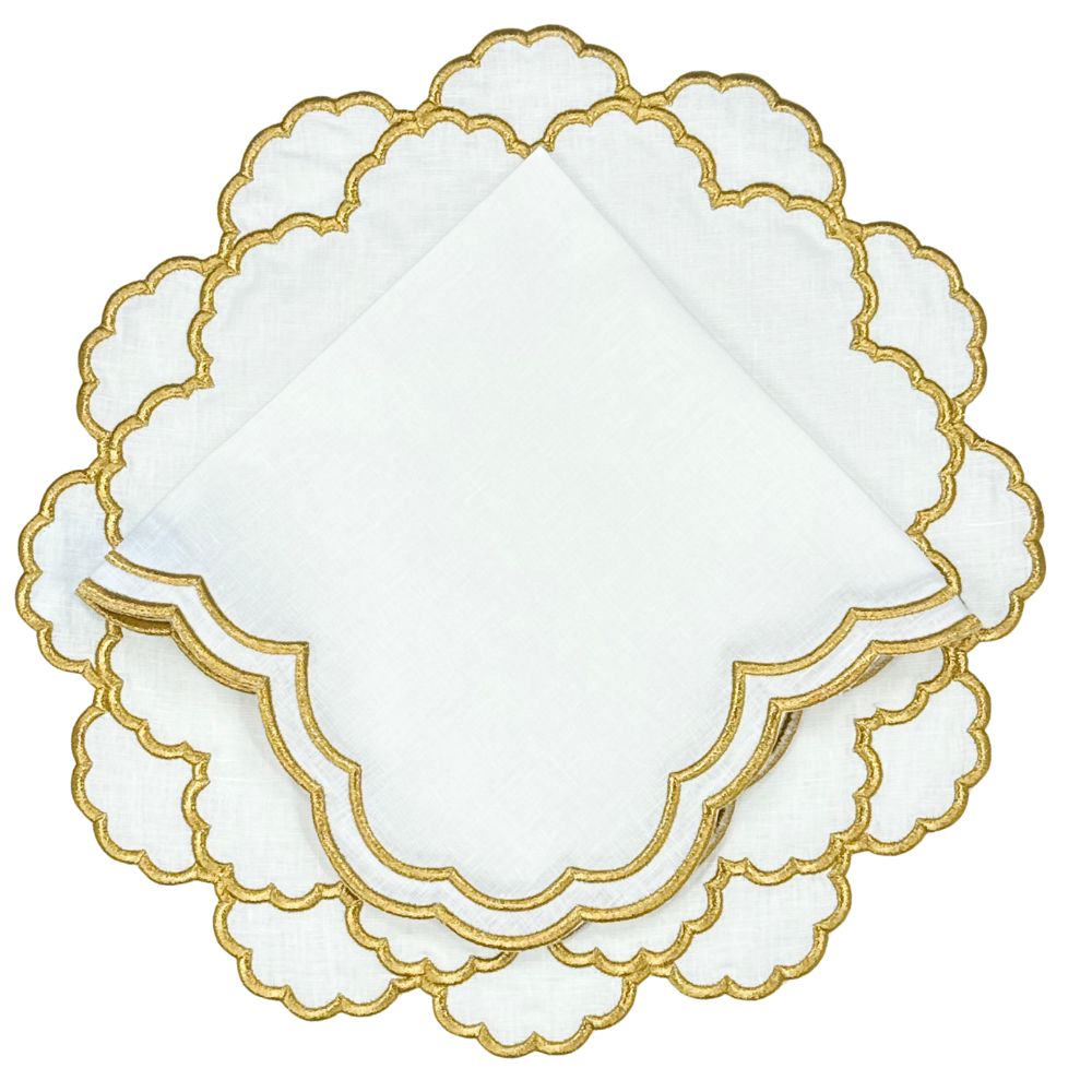 Luxury premium linen placemat with gold embroidery and matching gold embroidered napkin.