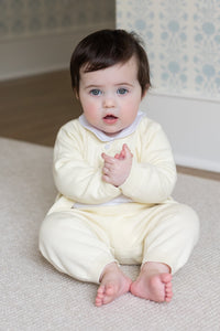 Little English traditional children's clothing. Long sleeve and long pant cream pointelle sweater set accompanied by a picot peter pan onesie in white for baby.