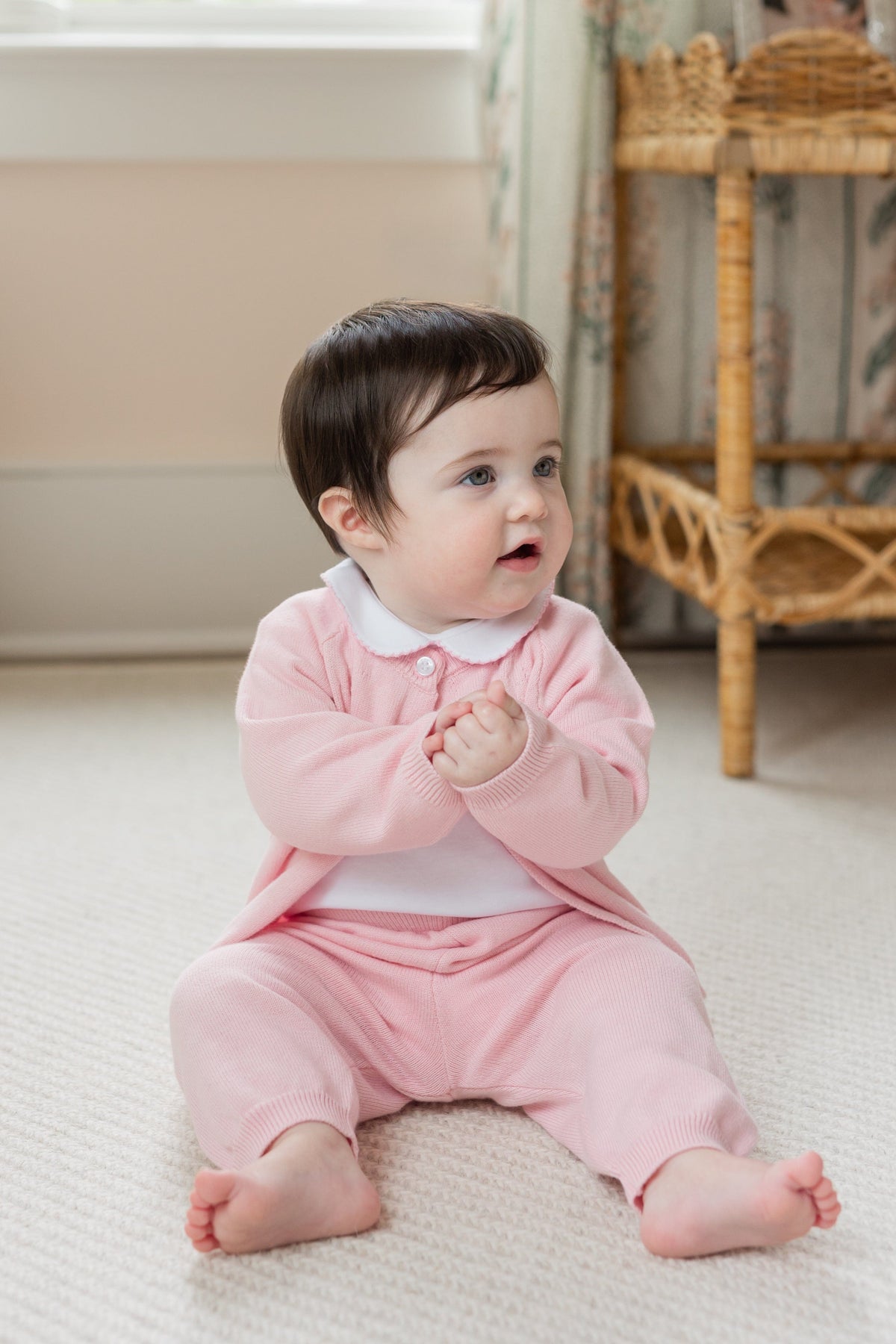 Little English traditional children's clothing. Long sleeve and long pant light pink pointelle sweater set accompanied by a picot peter pan onesie with light pink trim for baby girl