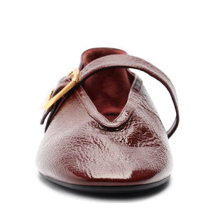 Courtney Buckle Patent Flat in Vino