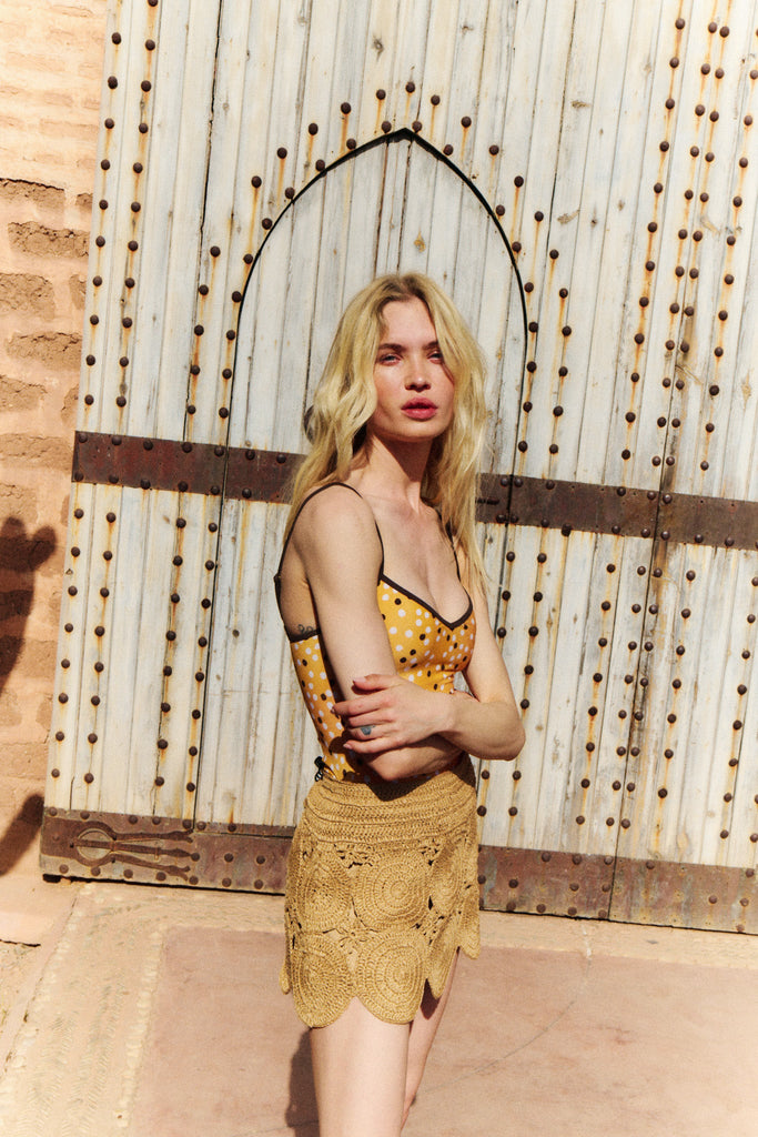 The Shea One Piece in Marigold Ikat Dot