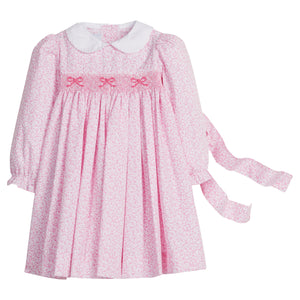 little english classic children's clothing girls pink and white floral long sleeve dress with peter pan collar, chest smocking, and bow embroidery for fall
