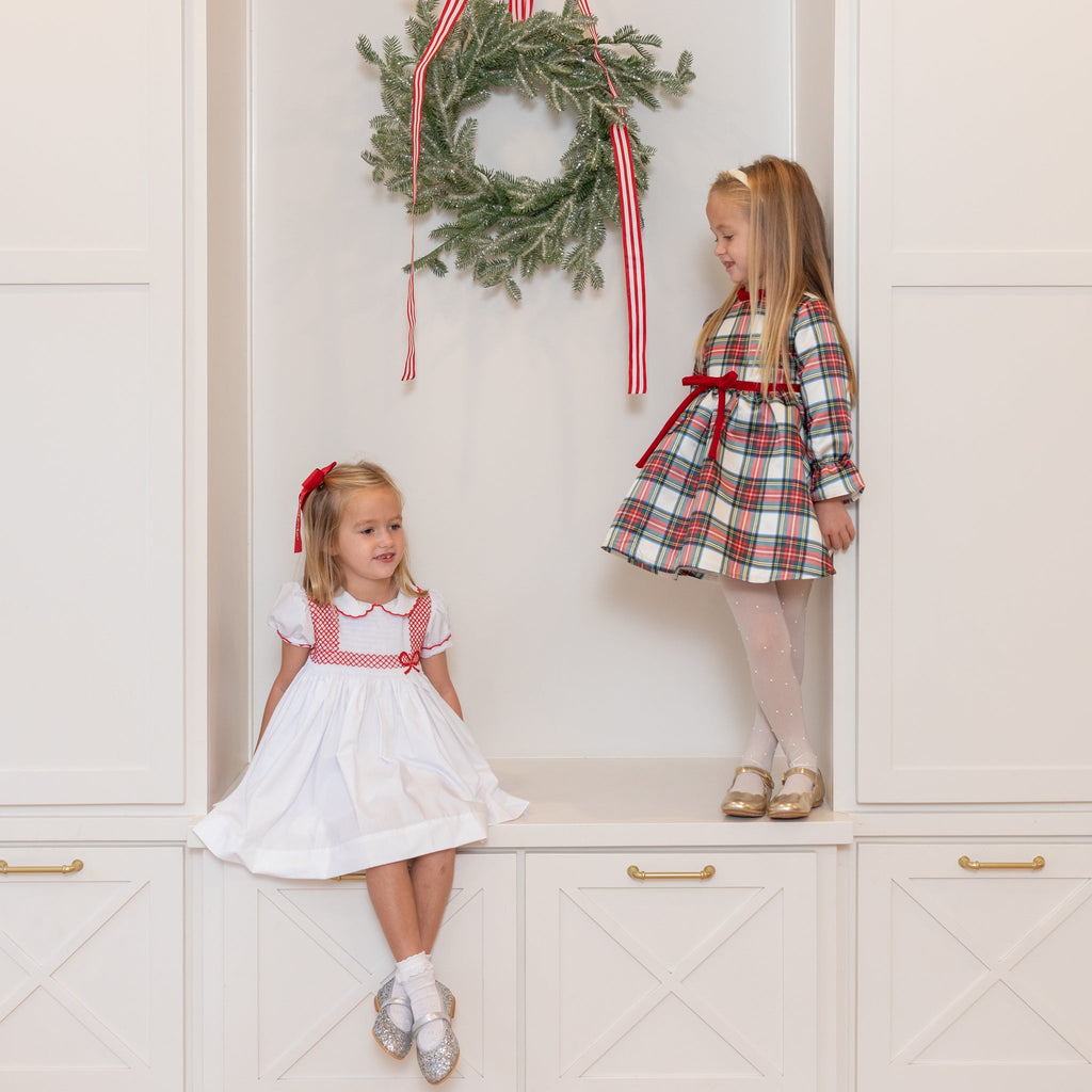 Girl's plaid holiday dress in Townsend Tartan with bow waist detail, vintage-inspired fit, perfect for family photos and festive gatherings – Henry Duvall classic