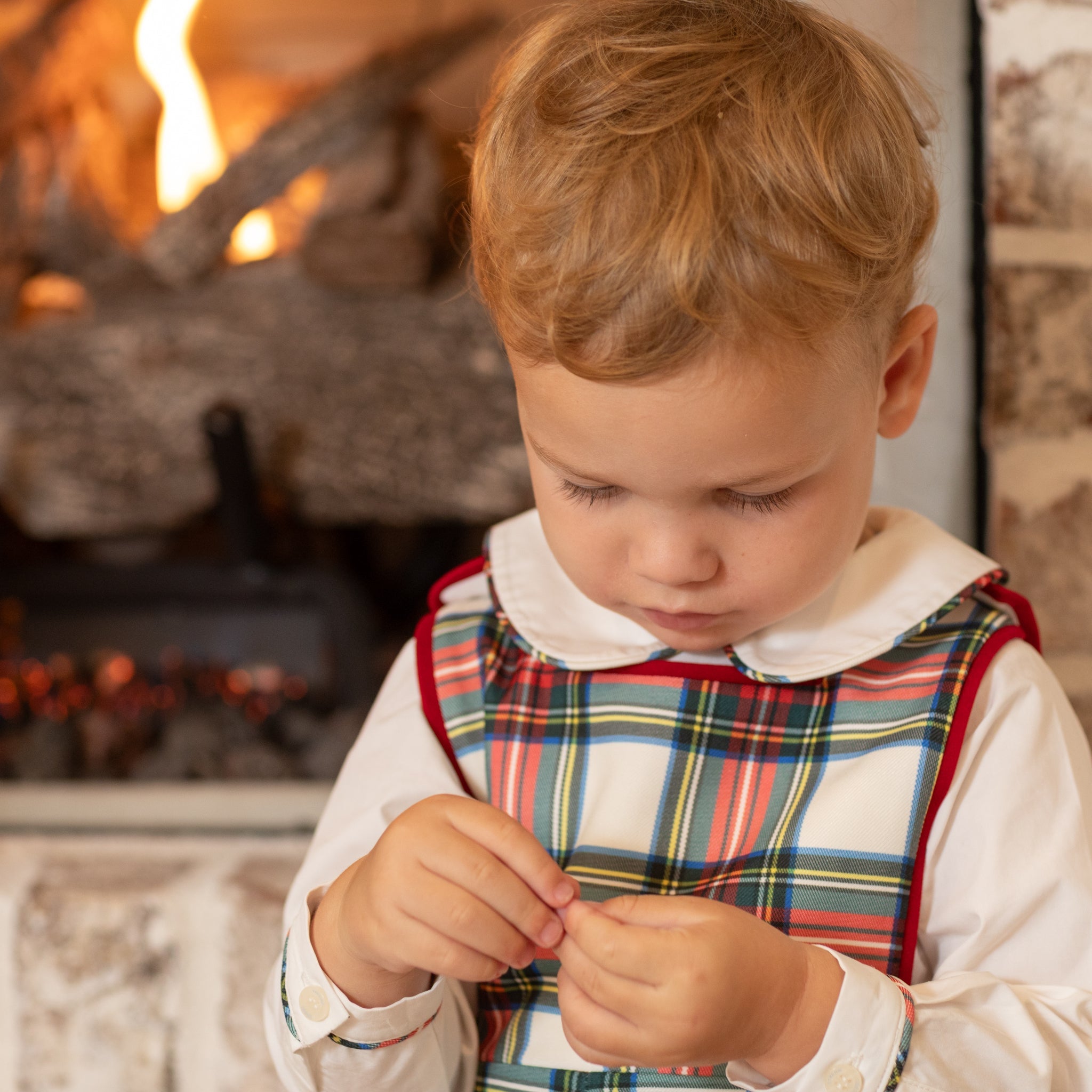 Henry Duvall classic baby boy jon jon in traditional red tartan, heirloom toddler outfit with shoulder buttons and stride snaps, inspired by English heritage style