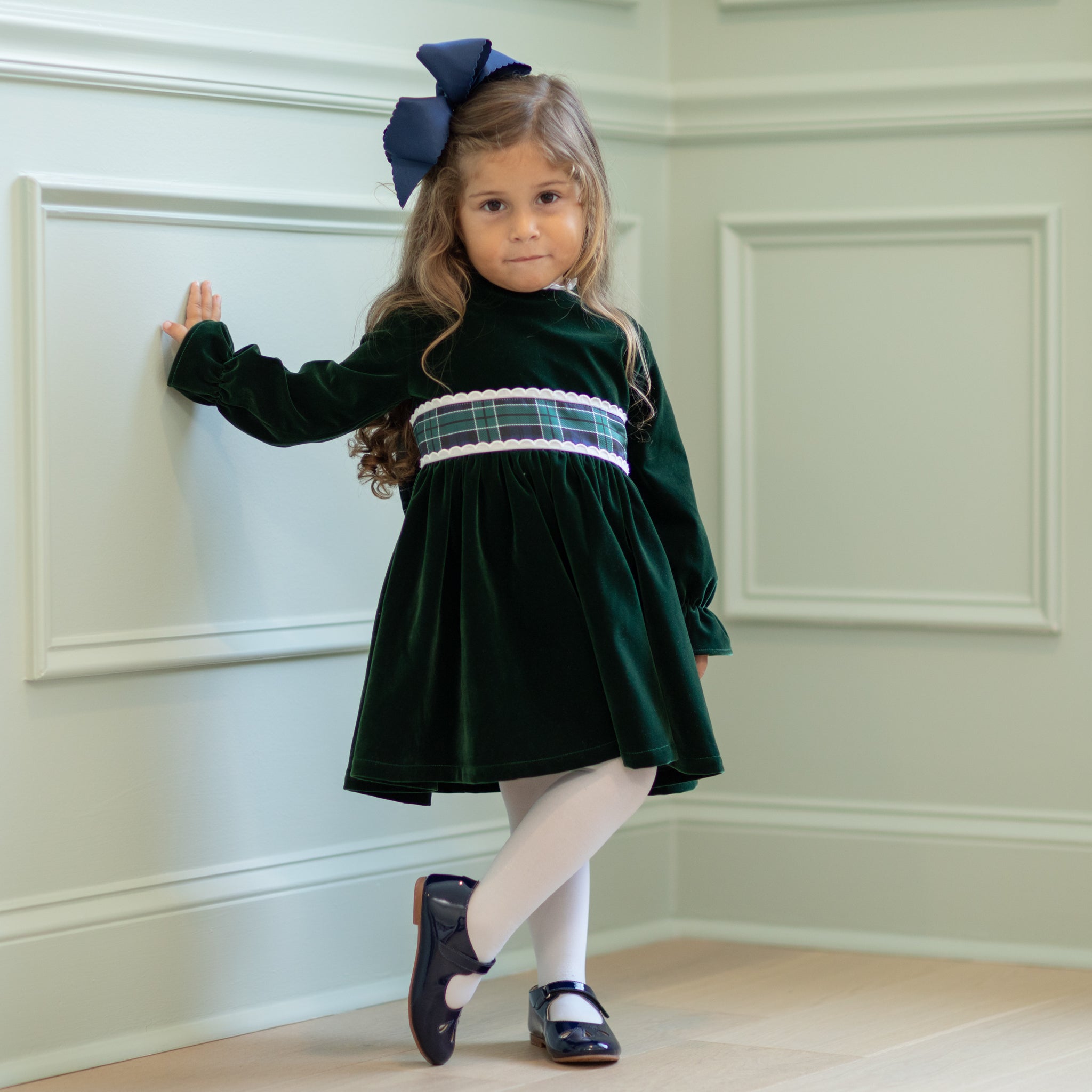 Henry Duvall Eliza Dress for girls in Grafton Green Velvet with white scalloped trim and a Newbury Tartan pre-tied sash, classic holiday dress for festive occasions