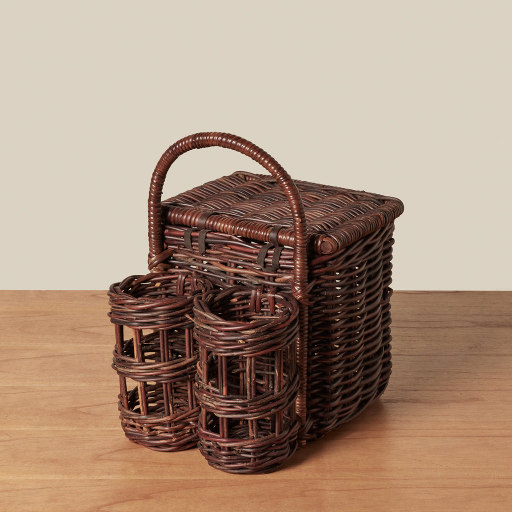 picnic basket on wooden table