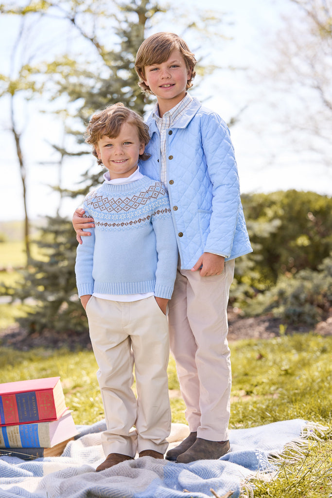 little english classic children's clothing unisex light blue, cream, and brown fair isle sweater, solid white turtleneck, pull on pant in pebble twill, quilted jacket in light blue, button down shirt in winthrop plaid, classic pant in stone corduroy for fall