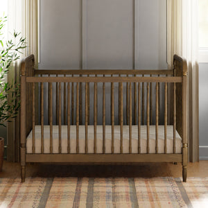 Liberty 3-in-1 Convertible Spindle Crib with Toddler Bed Conversion Kit in Natural Walnut