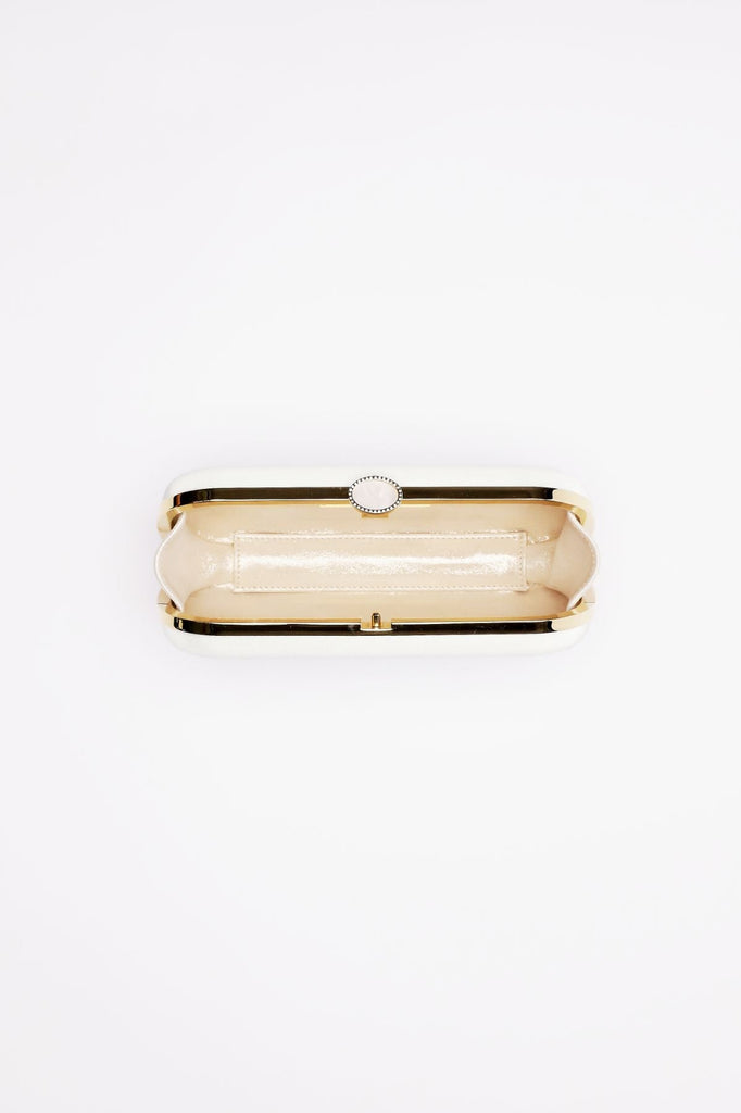 An open, empty Bella Clutch Ivory Petite made of Duchess Satin on a white background by The Bella Rosa Collection.