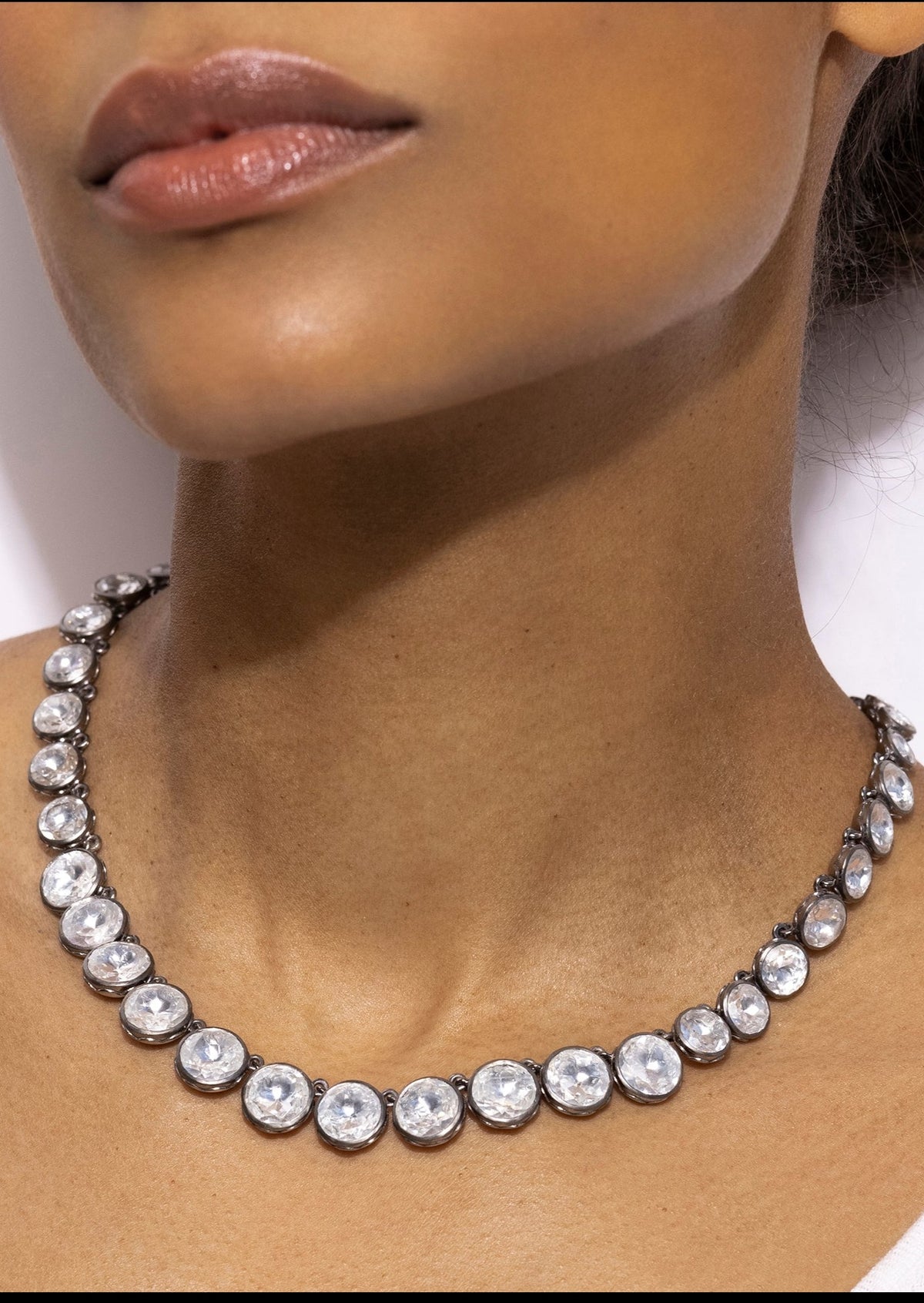 Catherine Round Rivière in White