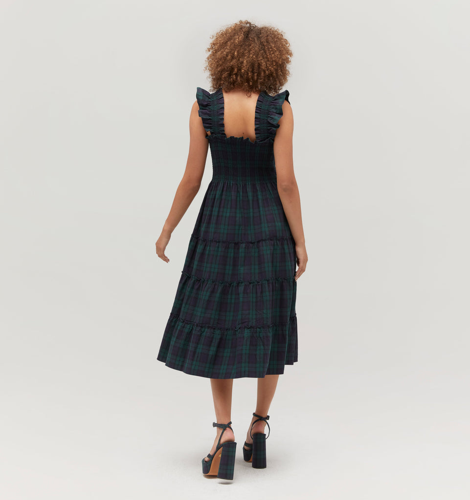 Gabriella is 5' 9.5" and wears a size XS in the Blackwatch Tartan color: Blackwatch Tartan