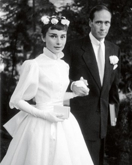 In Honor of Her Audrey Hepburn’s Birthday, A Look Back at Her Most Wedding-Worthy Dresses