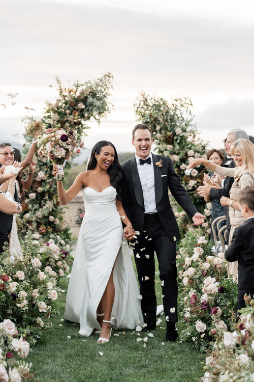 After Surprising The Groom With a Tahitian Dance, This Bride Changed Into a Taylor Swift–Inspired Mini Dress