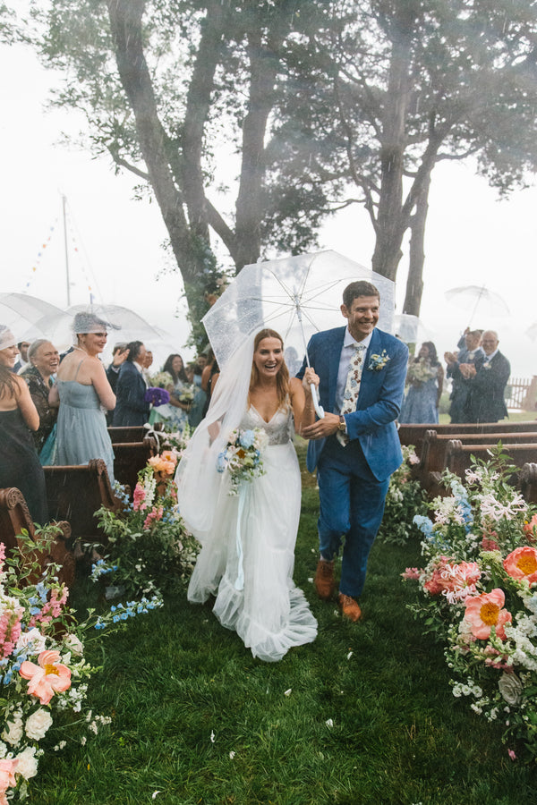 Rain During This Wedding Ceremony Only Energized Guests For The Reception at The Bride’s Family Home in Jamestown
