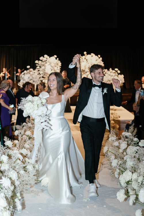 Instead of a Dress Change, This Bride Cut Five Inches Off of Her Hair Before Walking Down The Aisle