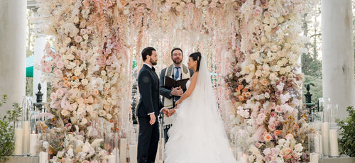 An October Wedding with a Spectacular Pink Floral Chuppah at the Audubon Nature Institute in New Orleans