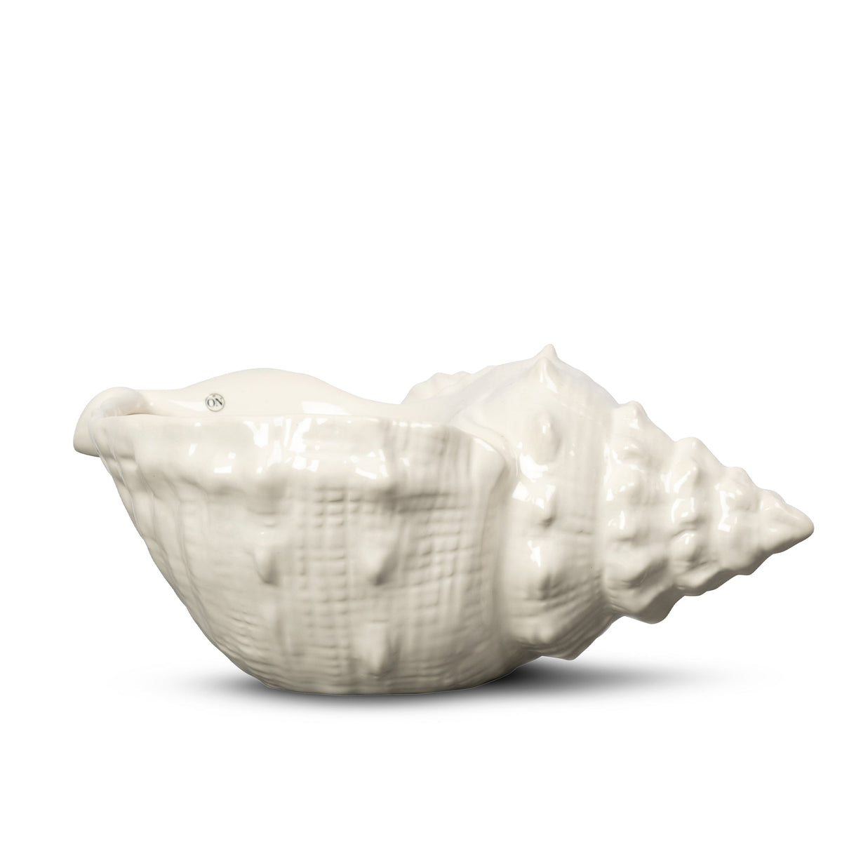 Side view of Awa Bowl in White, Ceramic showcasing its spirally twisted shell shape with a plain white background