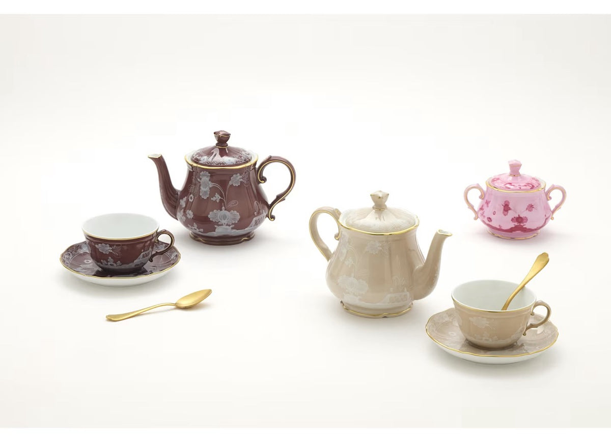 Front view of Oriente Italiano Meringa teapot with cover showcasing fine white porcelain on white background